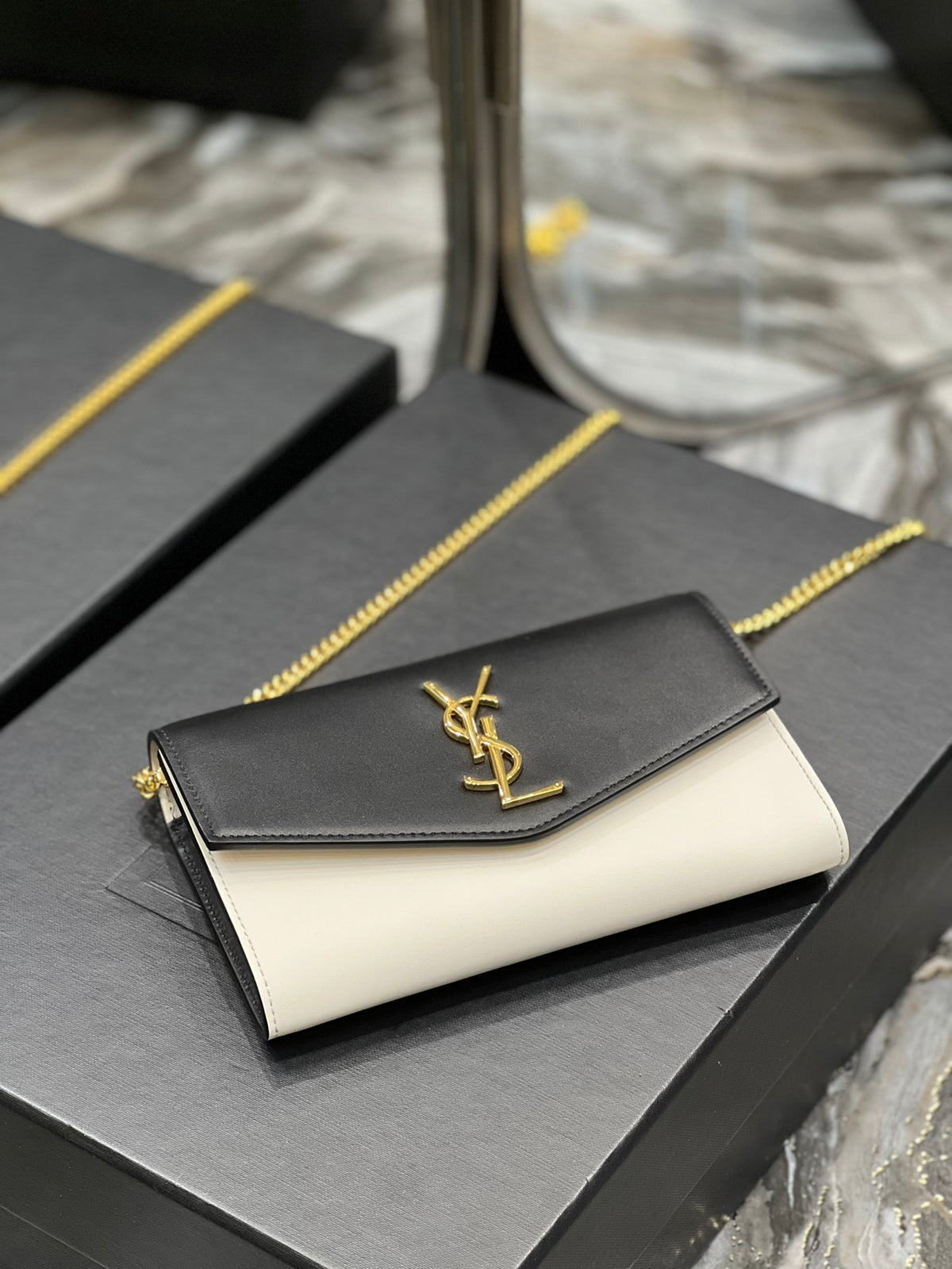 Saint Laurent Uptown Chain Wallet in Black and White Leather