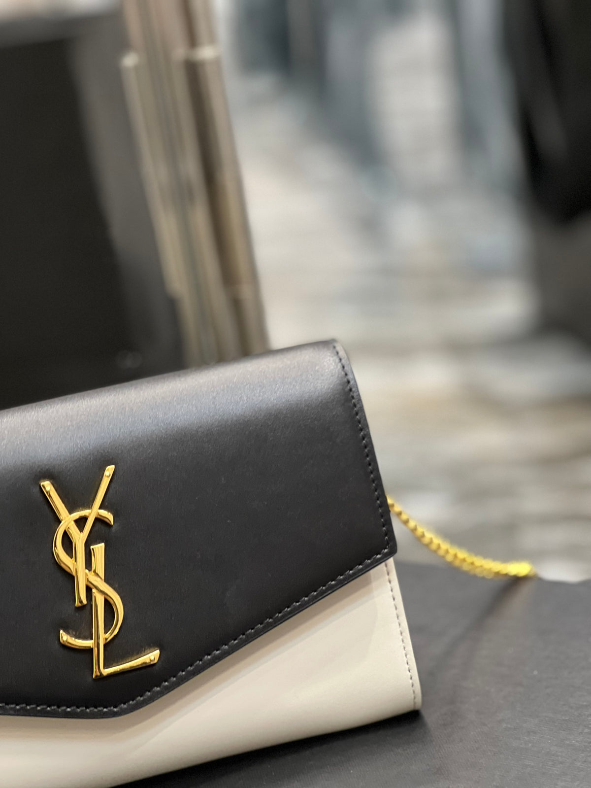 Saint Laurent Uptown Chain Wallet in Black and White Leather