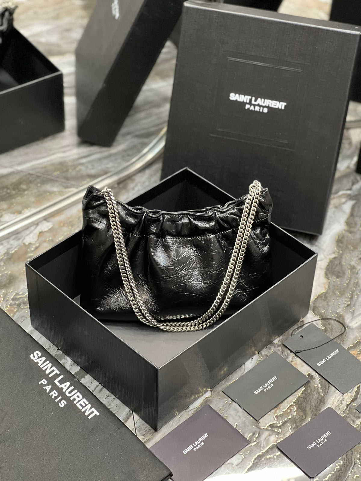 Saint Laurent Black Leather Mini Pouch Bag with Silver Chain and YSL Charm