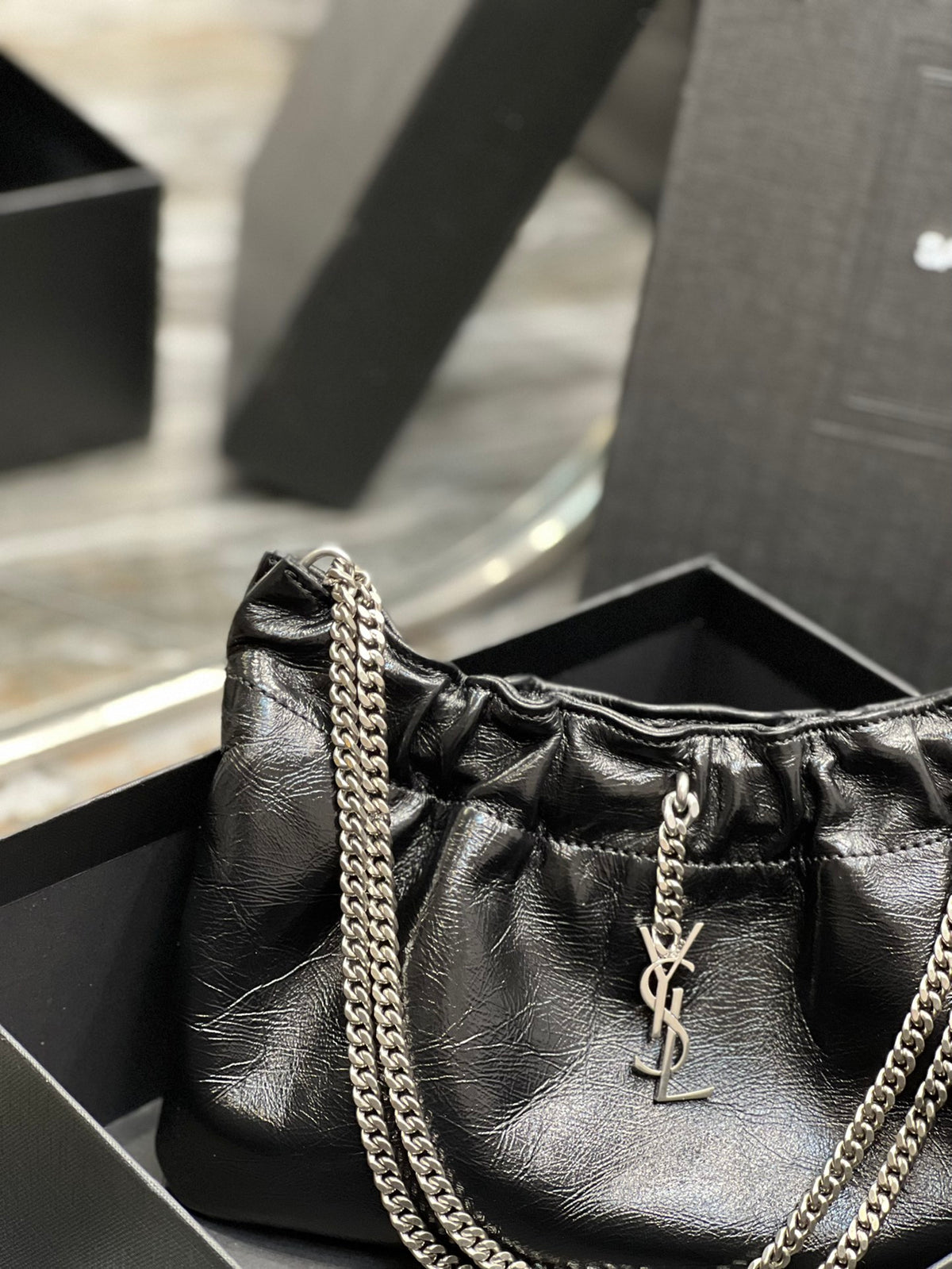 Saint Laurent Black Leather Mini Pouch Bag with Silver Chain and YSL Charm