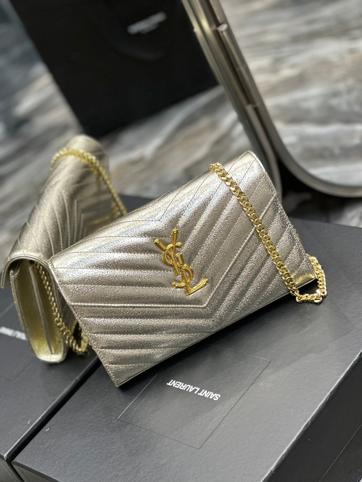 Saint Laurent Cassandre Matelassé Chain Wallet in Gold Leather