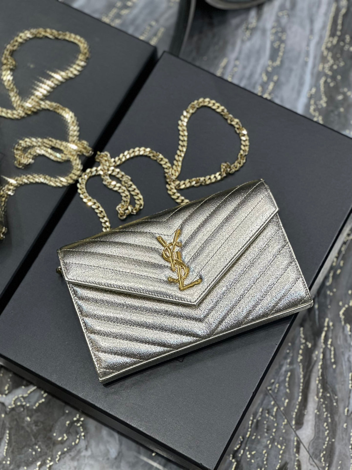 Saint Laurent Cassandre Matelassé Chain Wallet in Gold Leather